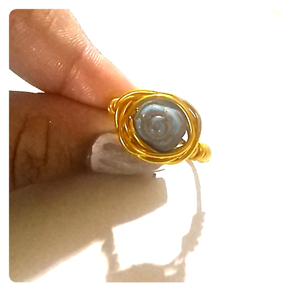 Cute baby blue rose and gold